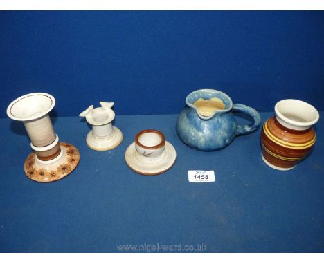 A blue mottled Ewenny pottery jug, a small Tenby candlestick, a pottery egg cup, a Jersey pottery candlestick, etc.