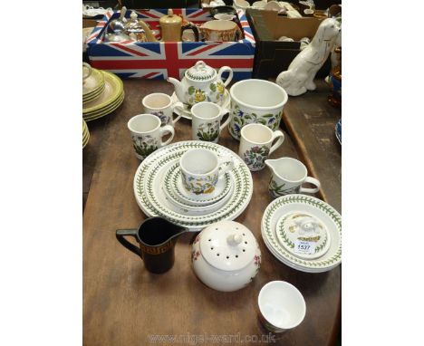A quantity of Portmeirion china including Botanical Garden, 'Welsh Dresser' plant pot, black jug, mugs, teapot, plates, etc.