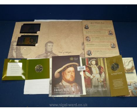A 2014 Guernsey the Centenary of First World 5 pounds,  a 2009 Henry VIII 5 pound uncirculated coin and the Great British UK 