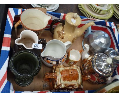 A quantity of china teapots and jugs etc, Dartmouth urn vase, Cottage jug and teapot etc, some insulated.