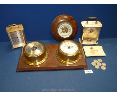 A brass Barometer and clock, wooden barometer, a/f and two quartz clocks.