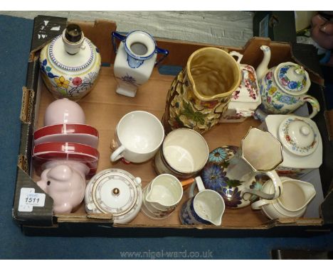 A quantity of china including; Poole pottery lamp base, Masons tea caddies (A/F), Carltonware, Royal Worcester jug etc. Some 