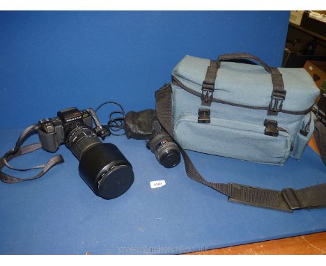 A Pentax camera outfit including a Pentax SFXn together with a Pentax SMC F 35-70 mm zoom 3.5 - 4.5 lens and a Sigma 170-500 