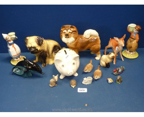 A quantity of china animals including novelty deer decanter, pig money bank, Poole dolphin, large Pug dog etc.