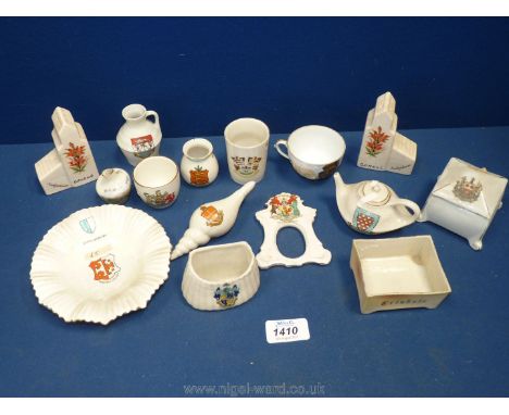 A small quantity of Crested ware including teapot, salt and pepper, vases etc.