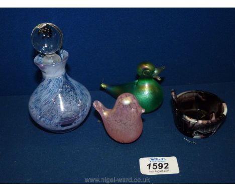 A small quantity of coloured glass to include; purple swirl Caithness perfume bottle, two small bird paperweights,purple &amp