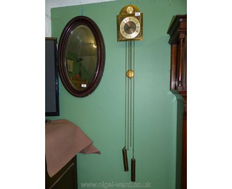 A Brass Wall Clock marked 'Tempous Fugit'