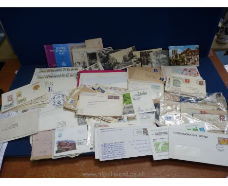 An assortment of stamps to include; First Day covers, postcards, etc.