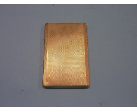 A 9ct. engine-turned gold cigarette case, slide-action, 202.4 grams