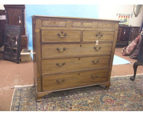 A large, early Victorian inlaid mahogany chest, arrangement of three shallow frieze drawers above two short and three long gr