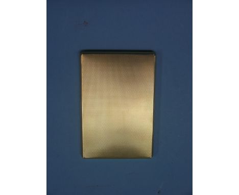 An engine-turned 18ct. gold cigarette case, slide-action, approx. 8oz.