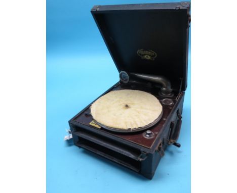 A Columbia Grafonola portable gramophone, with integral speaker, black vinyl case, also to include a pair of leather-cased bi