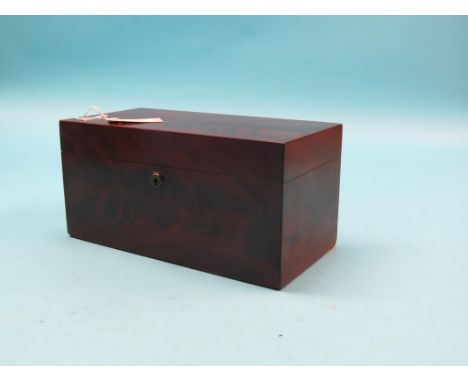 A Victorian flame-veneered mahogany tea caddy, twin-enclosed zinc-lined canisters, replacement glass mixing bowl, 13.5in.