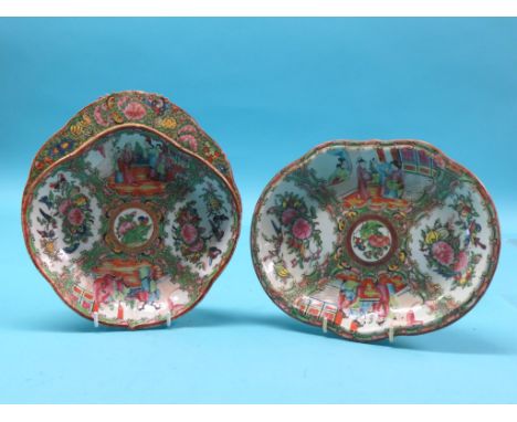 Two 19th century Canton enamel dessert dishes, each painted with figures, birds and foliage in bright enamels, 10in.