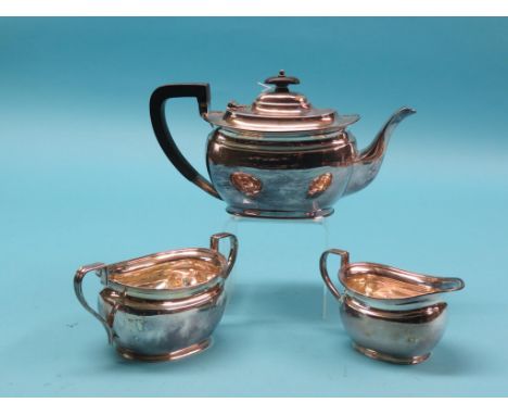 A silver three-piece teaset, teapot with ebony handle and finial, oval form, Atkin Brothers, Sheffield 1941, approx. 39oz. gr