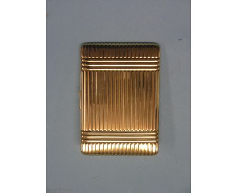 An 18ct. gold cigarette case, fluted design, between approx. 8.5-9oz. SEE ILLUSTRATION