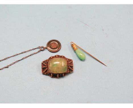 Chinese jewellery, jade brooch in yellow-coloured metal filigree mount, jade stick-pin and a jade pendant on white metal chai