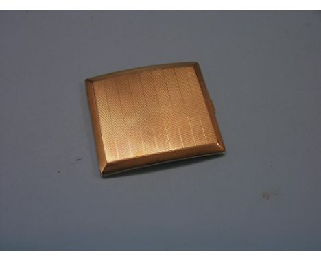 A 9ct. engine-turned gold cigarette case, approx. 130 grams