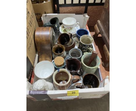 A collection of studio pottery and a mahogany mantle clock