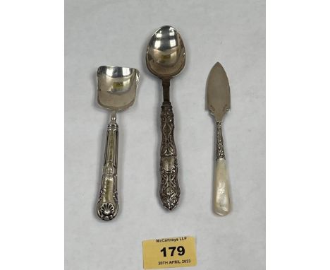 Two silver spoons with loading handles and a silver butter trowel with mother-of-pearl handle