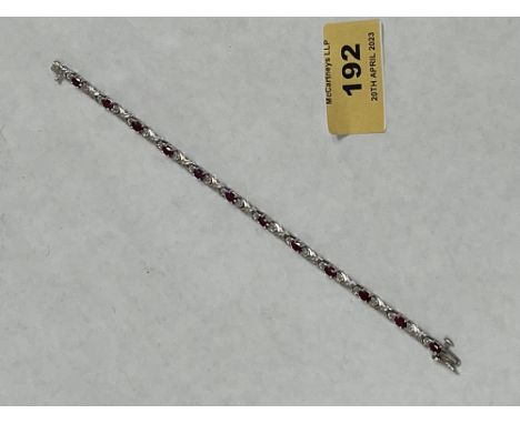 A ruby and diamond bracelet. In gold marked 14k. 8g gross