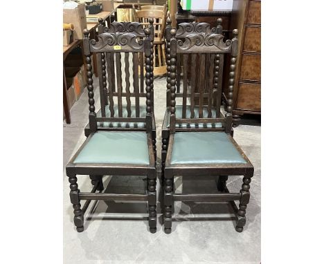 A set of four oak bobbin turned dining chairs 