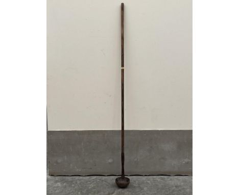 A railway iron ladle or scoop with treen handle. Impressed mark LNER. 84” long.