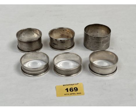 Six silver engine turned napkin rings. 2ozs 18dwts