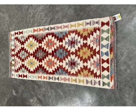 A Chobi Kilim carpet runner. 2.1m x 0.63