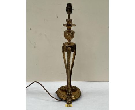 A gilt brass table lamp. 18½' high excluding fitting