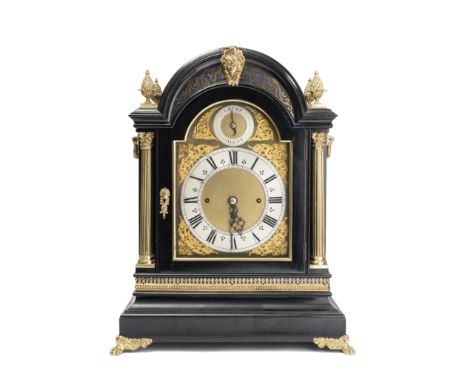 A late 19th century ebonised and gilt brass mounted chiming bracket clockin the George III stylethe arched case with Corinthi