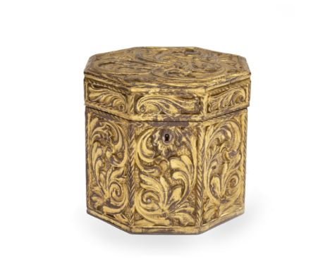 An unusual 19th century Continental carved wood and gilt gesso tea caddyof hexagonal form, the hinged lid and sides decorated