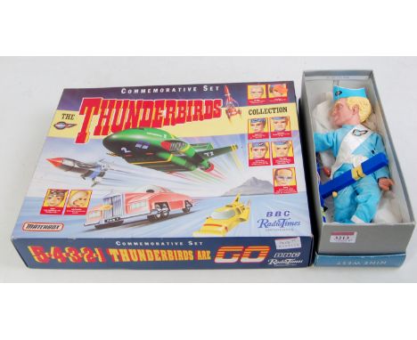 A Thunderbirds mixed box set and puppet group to include a Matchbox limited edition Radio  Times Thunderbirds commemorative s