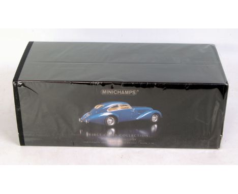 Minichamps First Class Collection 1/18th scale model of a Bentley Embiricos 1938, finished in dark blue, with cream interior,