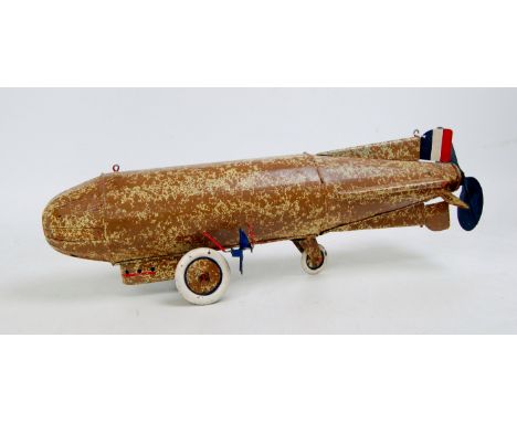 An Unusual repainted tinplate and battery operated model of a Air ship, finished in brown and light green, with 2 propellers,