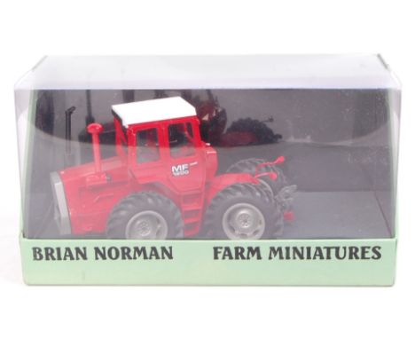 Brian Norman Farm Miniatures, 1/32nd scale model of a Massey Ferguson 1200 tractor, in the original green lift-off lid window