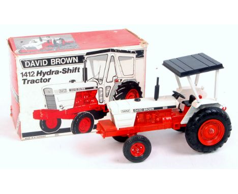 A boxed NZG 1/25th scale model of a No.156 David Brown 1412 hydro-shift tractor, finished in white and orange with orange hub