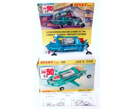 Dinky Toys, 102 Joe's Car, metallic green/blue body, red driver, on styrafoam tray of diorama sliding tray, with instruction 