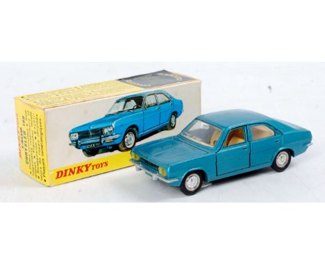 French Dinky Toys, 1409, Chrysler 180, metallic turquoise body, light tan interior, detailed hubs, in the original all card b