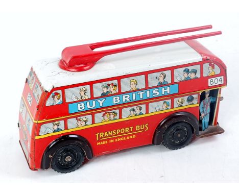 Wells Brimtoy large tinplate trolley bus, red with white roof and detailed tinprinted sides, with red trolley poles to roof, 