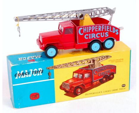 Corgi toys, 1121 Chipperfields circus crane truck, red body with light blue logo and wheels, operable chrome jib with hook, i