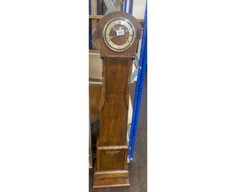 Grandaugther clock with pendulum, approximate height 54 inches 