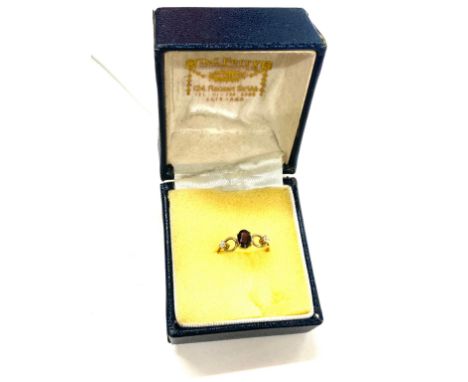 9ct gold garnet and paste ladies ring, ring size J, approximate weight 0.8g 
