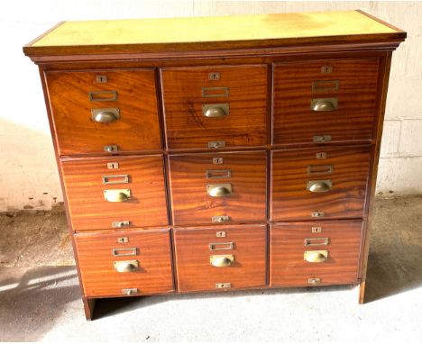 Vintage mahogany bank of 9 drawers measures approx 45 inches tall 48 inches wide 19 inches depth 