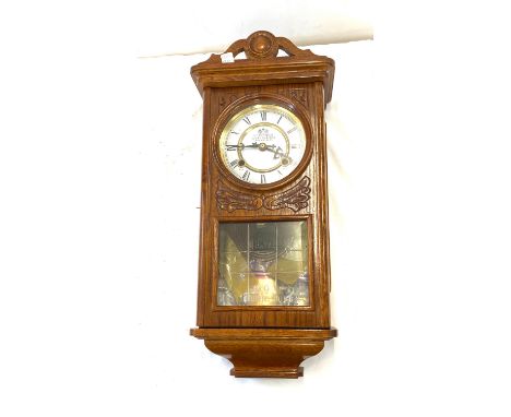 Wall hanging P Watts &amp; Son clock, overall length of clock 22 inches, Width 9 inches, with key and pendulum, untested 
