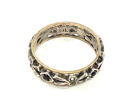 9ct gold and silver eternity ring set with multi coloured stones, approximate weight 2.1g 