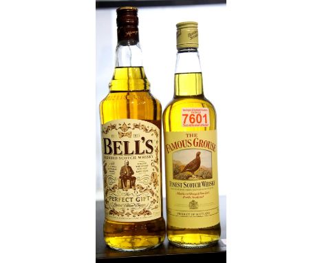 70cl bottle of Famous Grouse whisky and a limited edition 1L bottle of Bells Whisky. P&amp;P Group 2 (£18+VAT for the first l