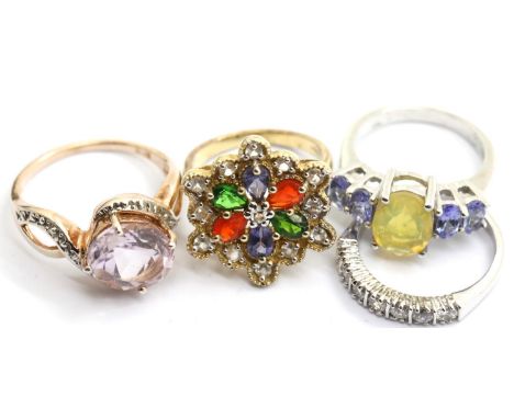 Four 925 silver assorted stone set rings, combined weight 14g. P&amp;P Group 1 (£14+VAT for the first lot and £1+VAT for subs