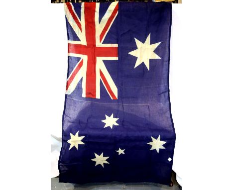 Australian national flag, 150 x 90 cm, showing signs of wear. P&amp;P Group 1 (£14+VAT for the first lot and £1+VAT for subse