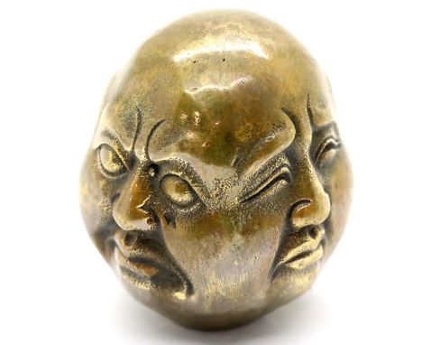 Four faced Buddha head with impressed seal mark to base, H: 6 cm. P&amp;P Group 1 (£14+VAT for the first lot and £1+VAT for s